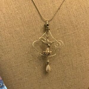 Elegant Silver and Pearl bird Necklace